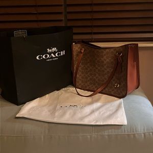 Coach Signature Leather Tyler Handbag